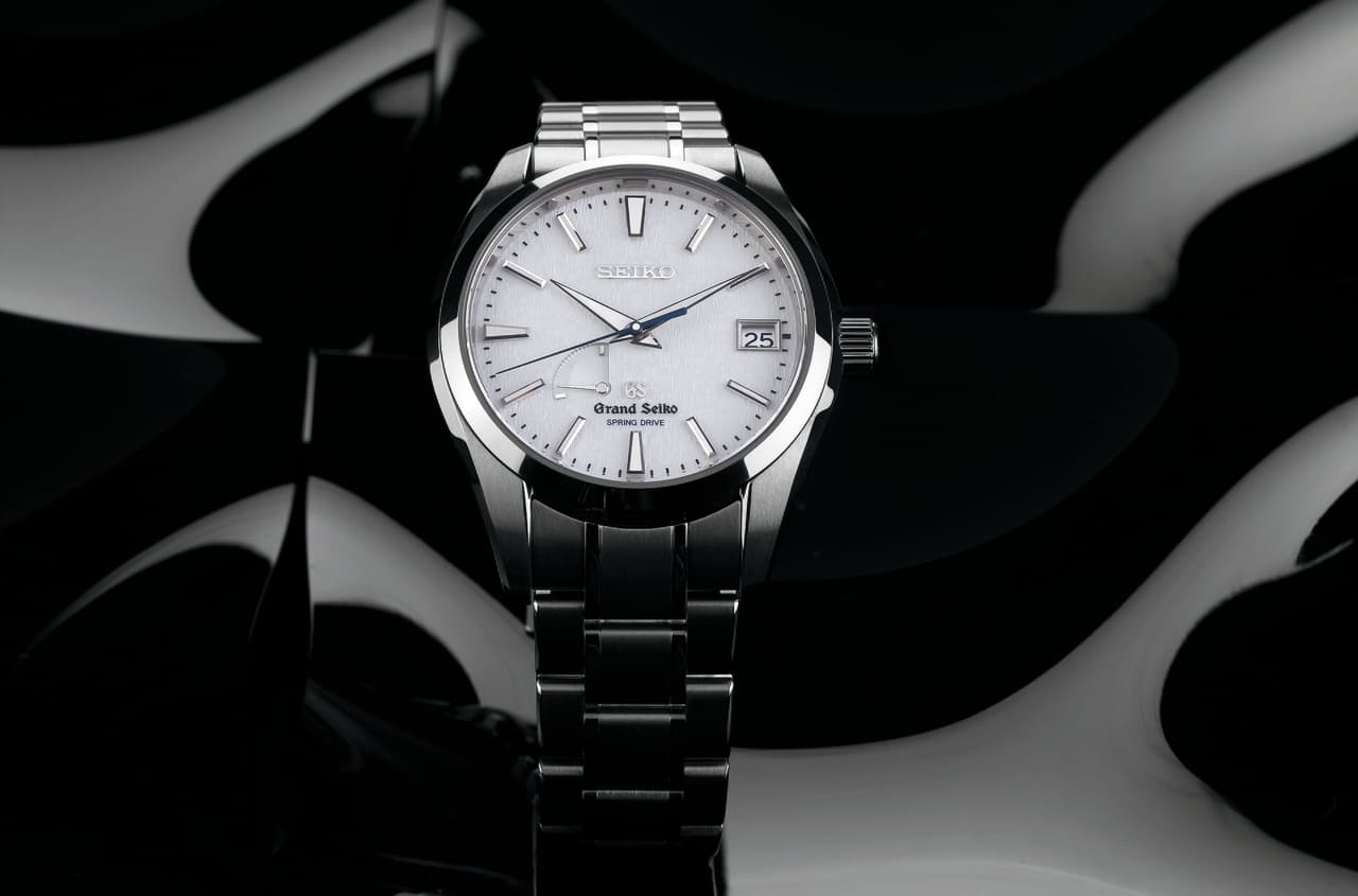 A Grand Seiko SBGA011 wristwatch showing the flat mirror-polished case surfaces and sharp ridge lines that Zaratsu polishing produces — illustrative of the technique, not a photograph of the polishing process